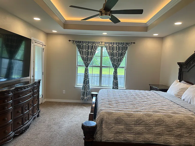 Owner Suite Bedroom with recess, lighting, as well as a coffered lighting in the Crawford ceiling