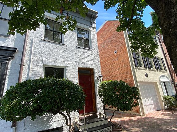 sidewalk view of the home
