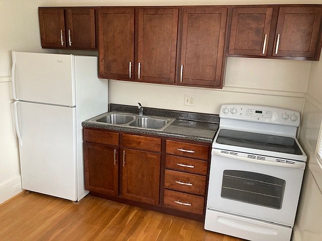 Kitchen with recent upgrades and hardwood floor