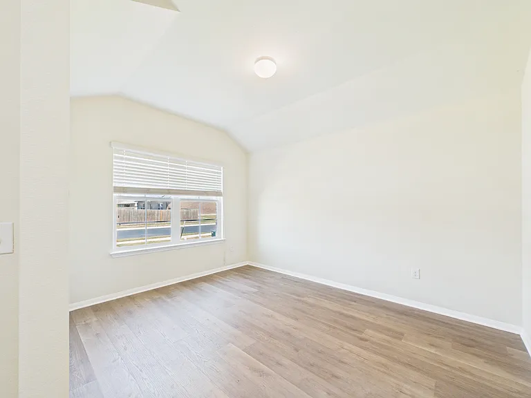 Off to the left is a wonderful flex room great for home office