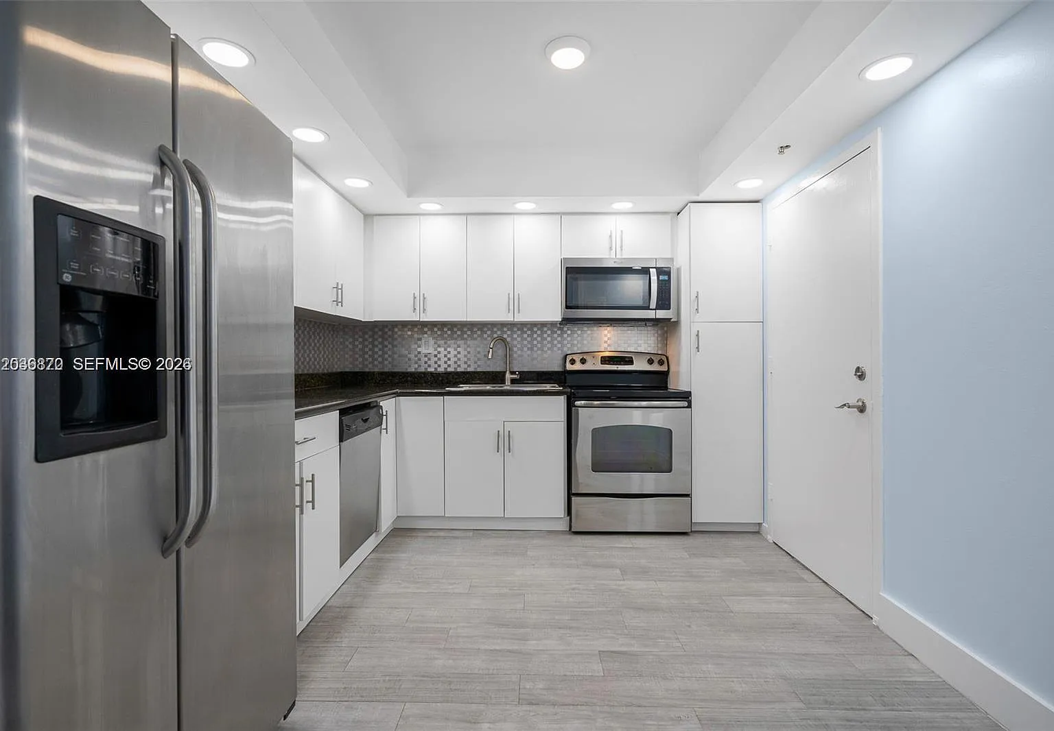 Commodore Plaza Condo — Photo 4