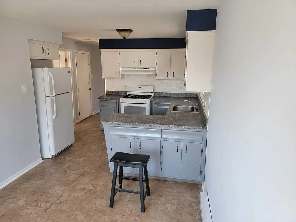 Building Photo - 7134 Windsor Ave #2