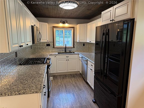 5th image of 4876 Washington St W