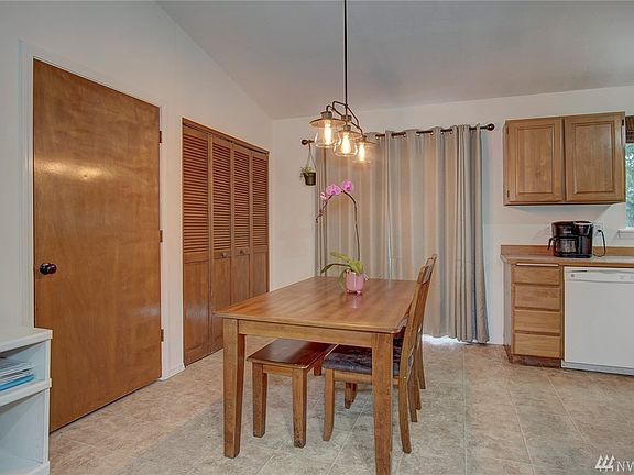 Dining area with walk-in pantry.