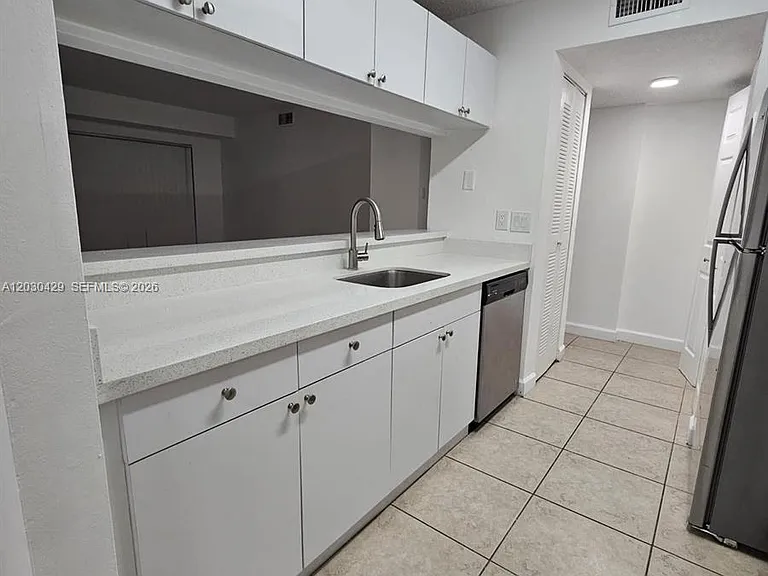 15771 SW 106th Ter #204 — Photo 22