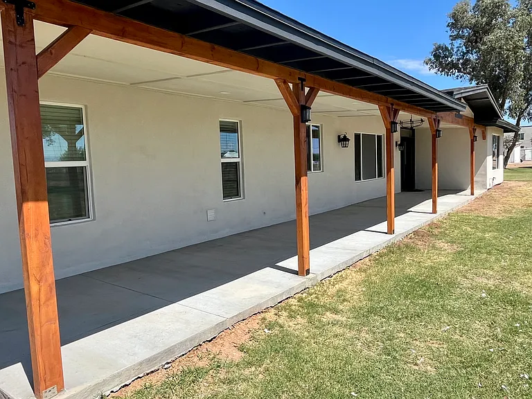 Newly installed 500 square foot covered porch with recessed and coach lights. Great for outdoor living