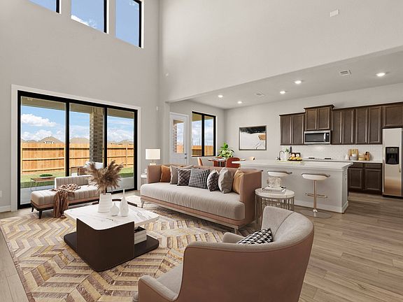 Open concept living space. Note Sample product photo - actual exterior and interior selections may