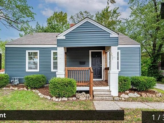 Also front of house. This area of Garth is NOT a bad area. Yard is partially fenced and will be completely fenced before winter. 2 blocks from Hickman High School. 1 block from Business Loop.