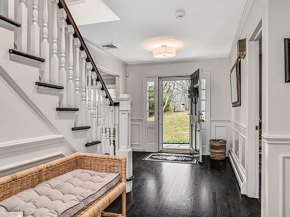 Foyer featuring detailed molding