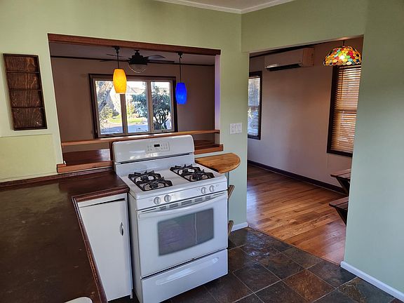 Kitchen to front room, nook, gas stove