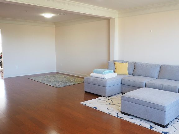 Dining room next to living room that is used as an open space