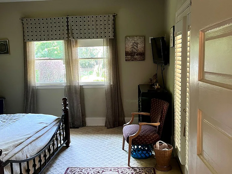 Master bedroom with tray ceiling. Sonos Speakers in ceiling. TV hookup on wall