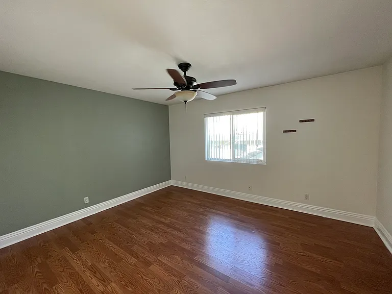 Secondary bedroom (larger) with width closet