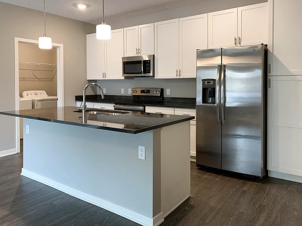 Sleek appliances and plenty of cabinet storage adorn our kitchens.