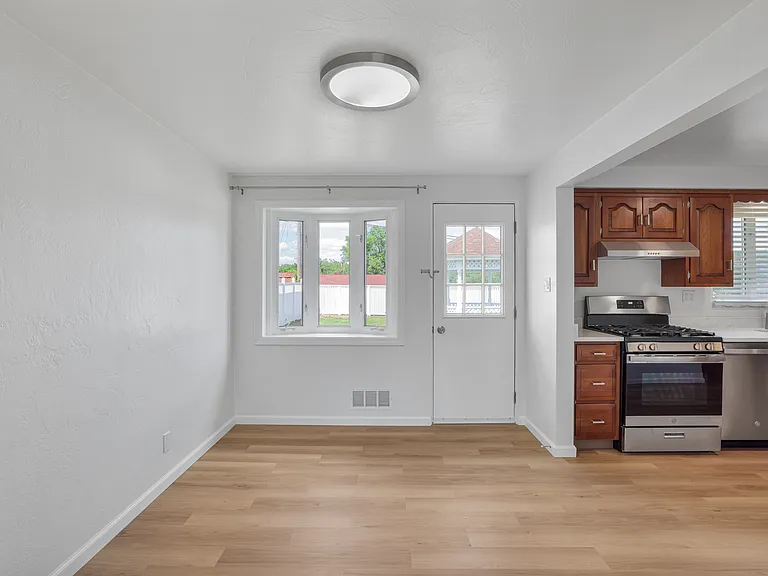 dining room with back door access