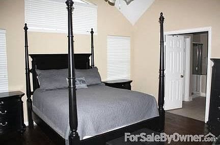 Master Bedroom : Custom wooden blinds in all rooms.