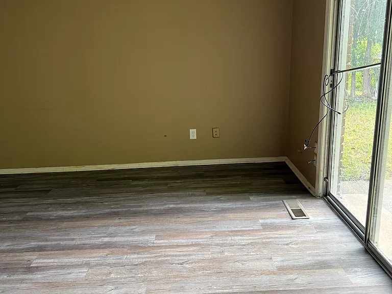 Large living room
Sliding doors open onto fenced backyard