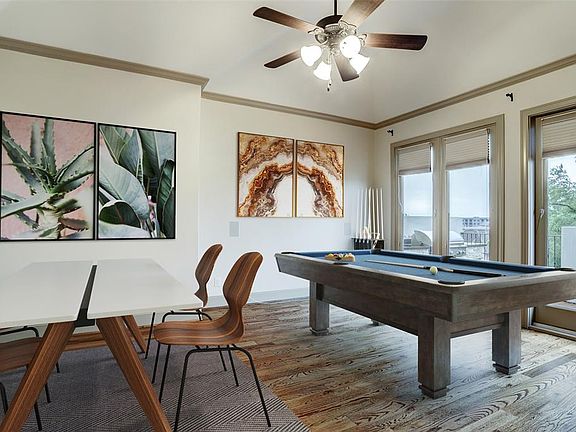 Fourth floor: a view of the game / media room. Rooftop terrace located to your right.