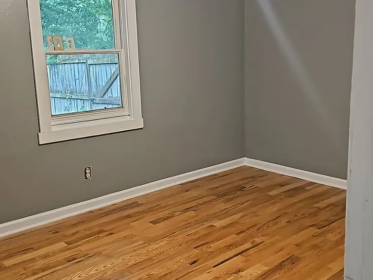New hardwoods and fresh painted bedroom 1