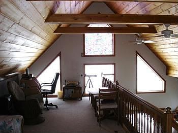 No chalet is complete without a beautiful and brightly lit loft. With a 15 x 18 bedroom and 34 bathr