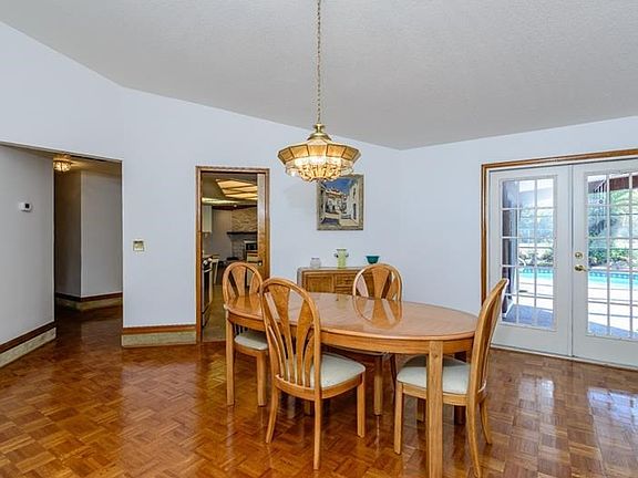 Formal Dining Room (15.10'x17') Could also Become a Living Room & Has Fantastic View of Pool.