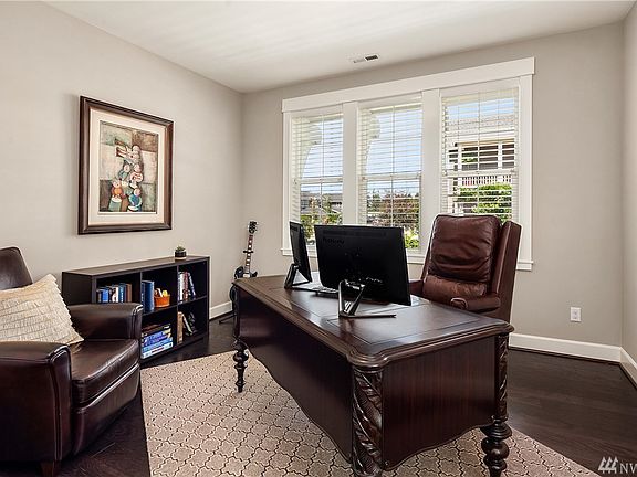 This main-level bedroom can become an office, den or library.