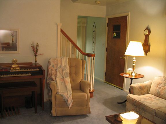 Stairway, front door, & entry to formal DR