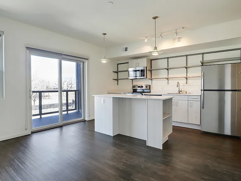205 Kitchen & Living Room, 203 has same "Rio Grande" layout, finishes & features
