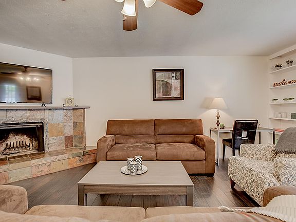Cozy and welcoming living room. Open to the kitchen and dining.