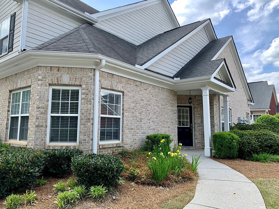 Brick exterior, maintenance free community.