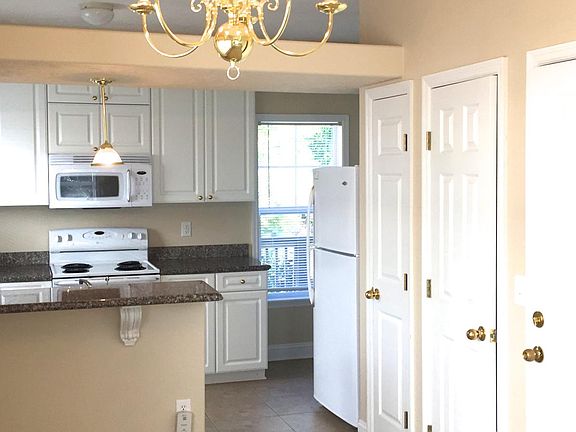 View of kitchen from dining room