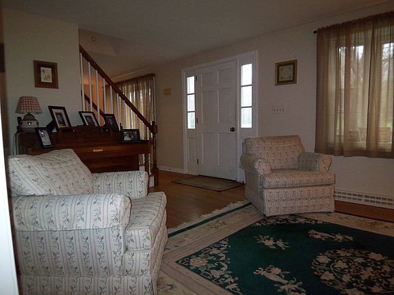 Beautiful bay windows grace the front of the house