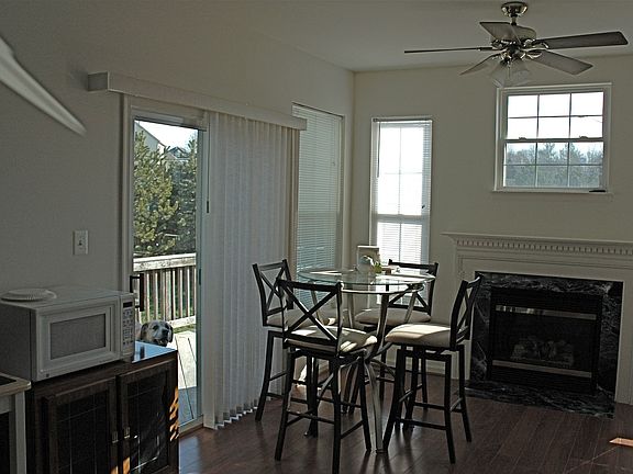 Family Room with gas fireplace & access to deck