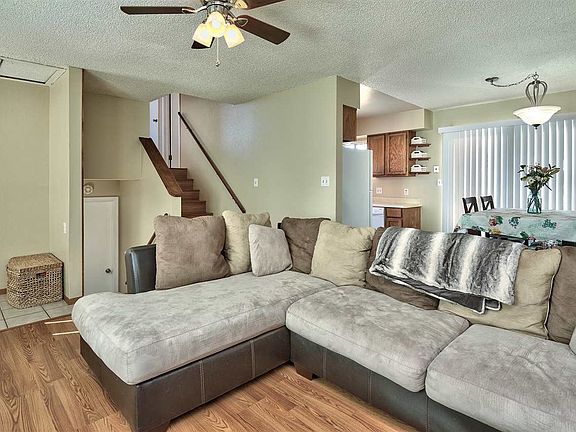 Step through the front door and into the living room - with the dining area and 