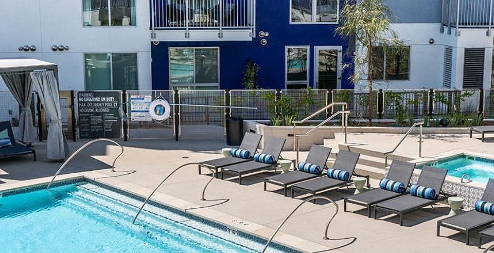 Community heated pool/jacuzzi and cabanas.