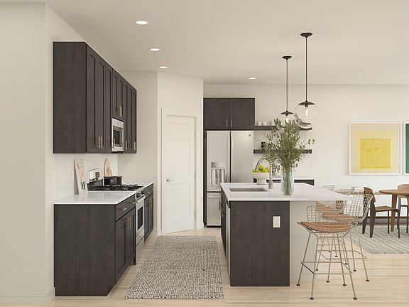 Dark stained cabinets in kitchen