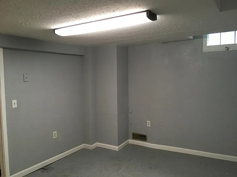 Basement bonus room - at bottom of stairs.