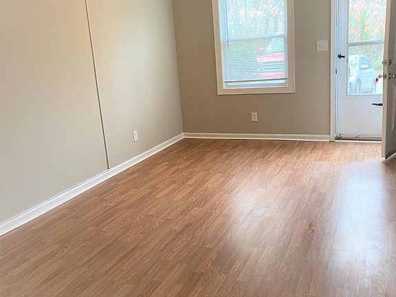 Spacious Living room with new floors & paint