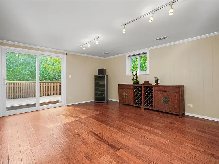 Another family room on sub level with sliding doors