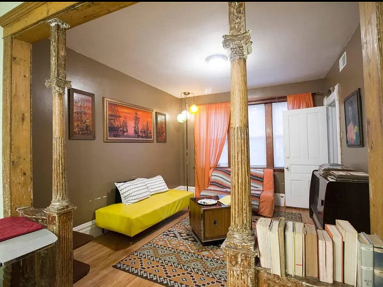 staged photo of living room - room has since been painted / renovated