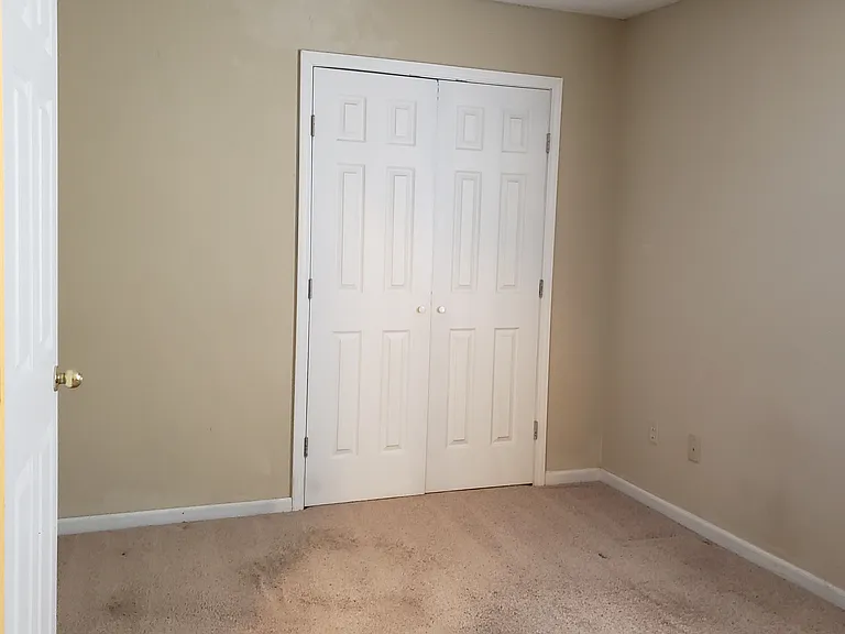 One of the bedrooms showing closet