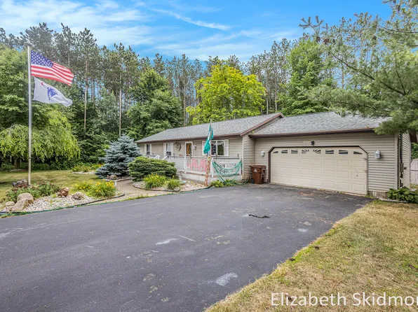 8763 Navaho Trl, Howard City, MI 49329