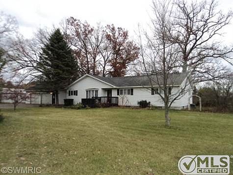 Looking for a hobby farm or more? Have it all with this sprawling 4+bedroom, 3 bath ranch  w/ attached 2+car garage. Features include a full basement, fireplace, 5 outbuildings, all on 60 acres. 40 + is tillable. Has a deer blind and pool table included. Great location between white cloud and big rapids on M 20. Buildings include equipment storage, tractor barn, workshop barn, motor home or boat storage and animal barn. Can heat home with wood furnace or oil fueled baseboard heat.
