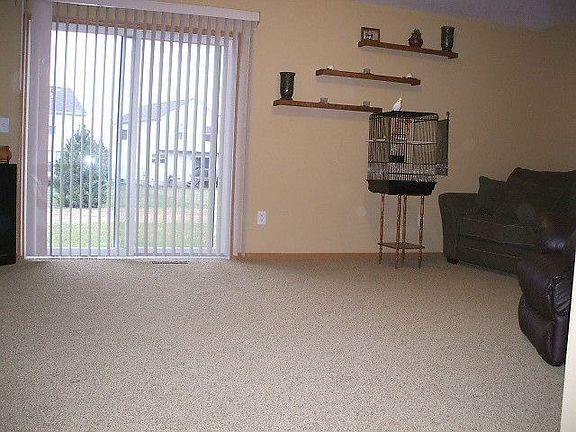 Big family room looks out into oversized lot