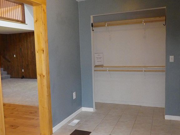 Large foyer with storage closet