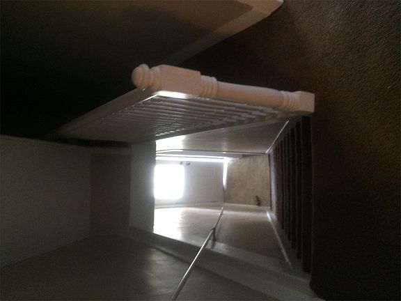 Stairwell connecting downstairs with upstairs bedrooms