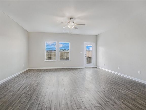 The living area provides plenty of space to host family and friends.