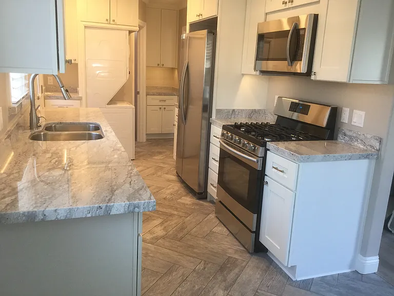 microwave, gas stove, large refrigerator