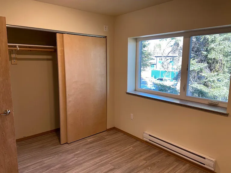 Another photo of rear bedroom