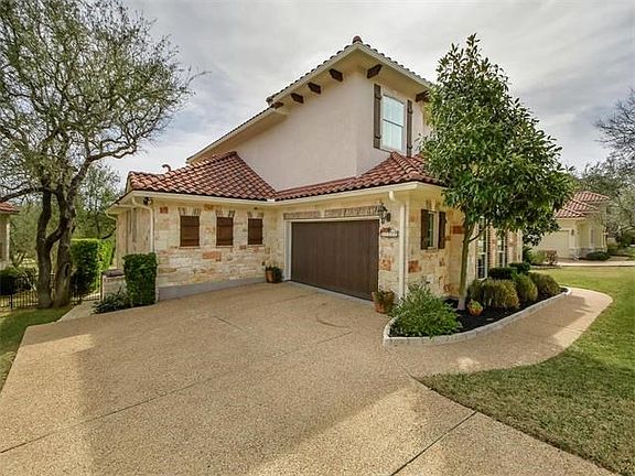 Manicured lawn and walkways complete this perfect setting...
